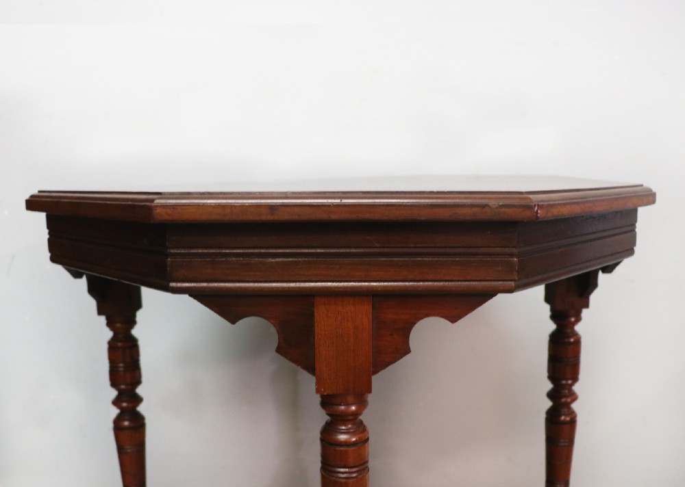 A Late Victorian lovely American walnut octagonal lamp table. View V