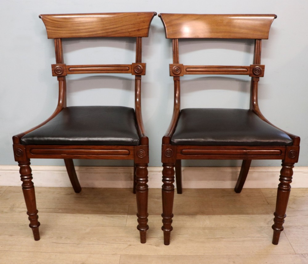 A lovely set of four late Georgian or William IV mahogany bar back dining chairs. View IX