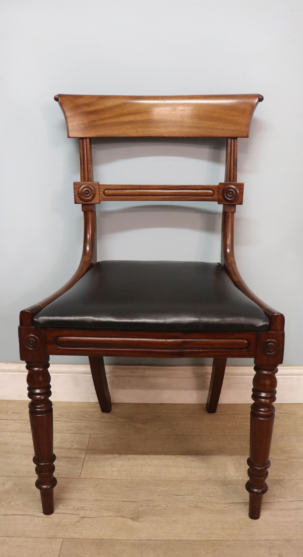 A lovely set of four late Georgian or William IV mahogany bar back dining chairs. View XIV