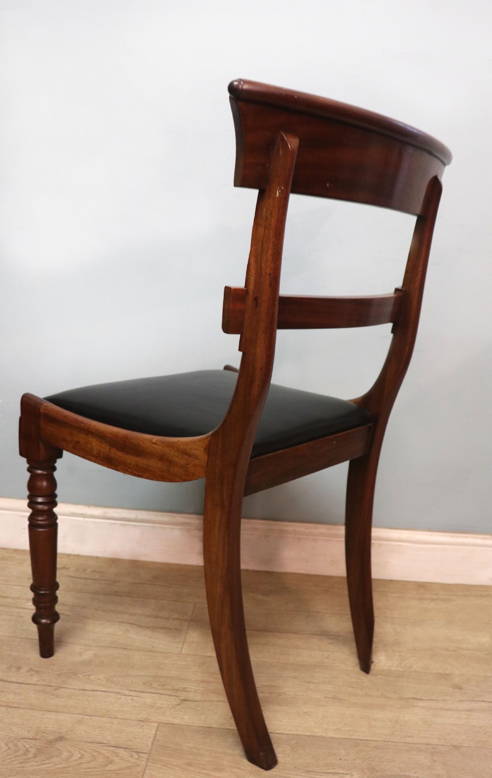A lovely set of four late Georgian or William IV mahogany bar back dining chairs. View XVIII