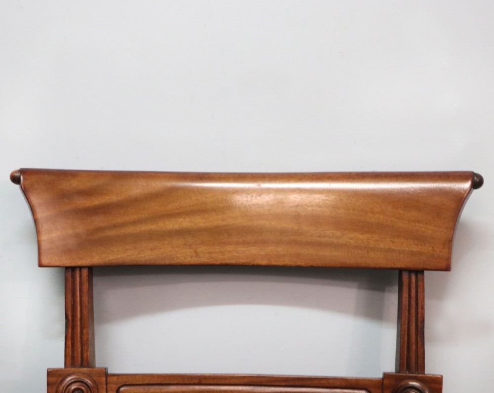 A lovely set of four late Georgian or William IV mahogany bar back dining chairs. View XXIII