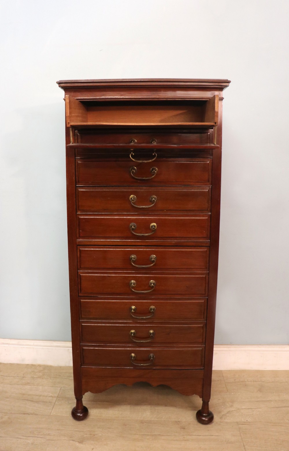 A lovely unusual early 20th century mahogany music cabinet or chest with ten drawers. View II
