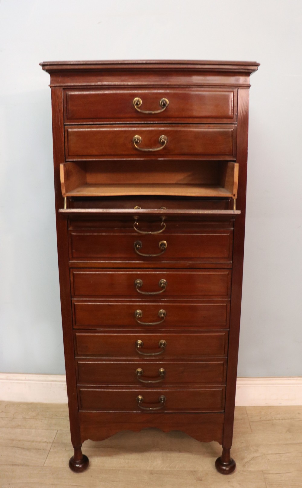 A lovely unusual early 20th century mahogany music cabinet or chest with ten drawers. View V
