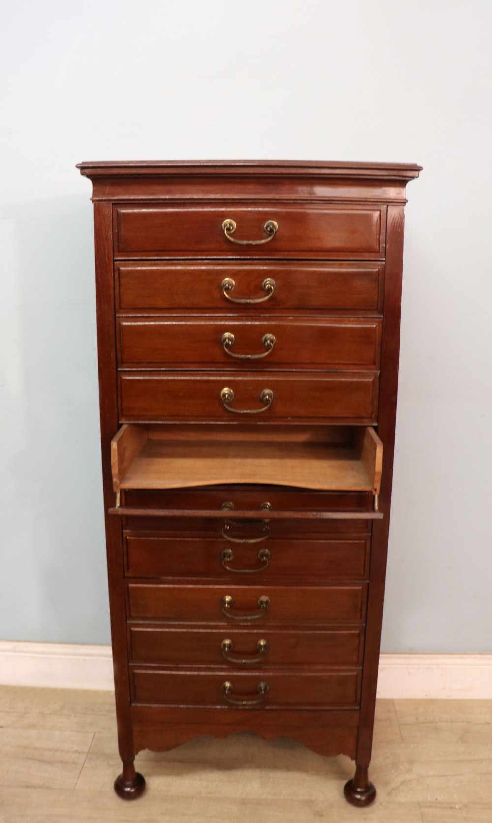 A lovely unusual early 20th century mahogany music cabinet or chest with ten drawers. View VII
