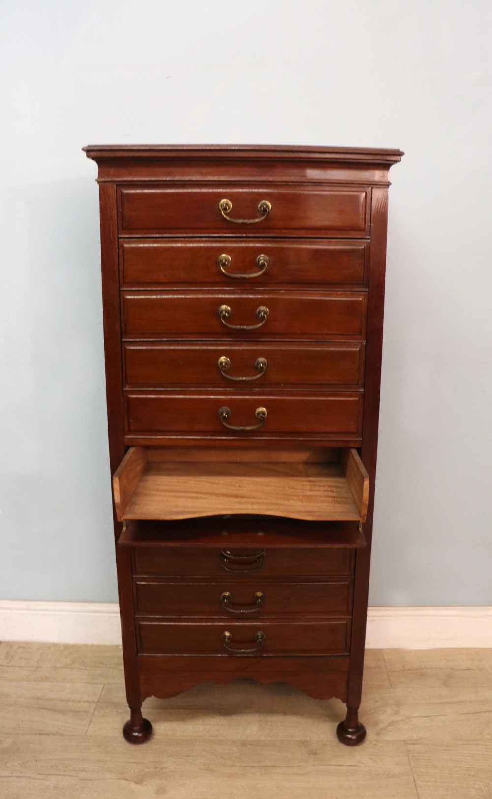 A lovely unusual early 20th century mahogany music cabinet or chest with ten drawers. View VIII