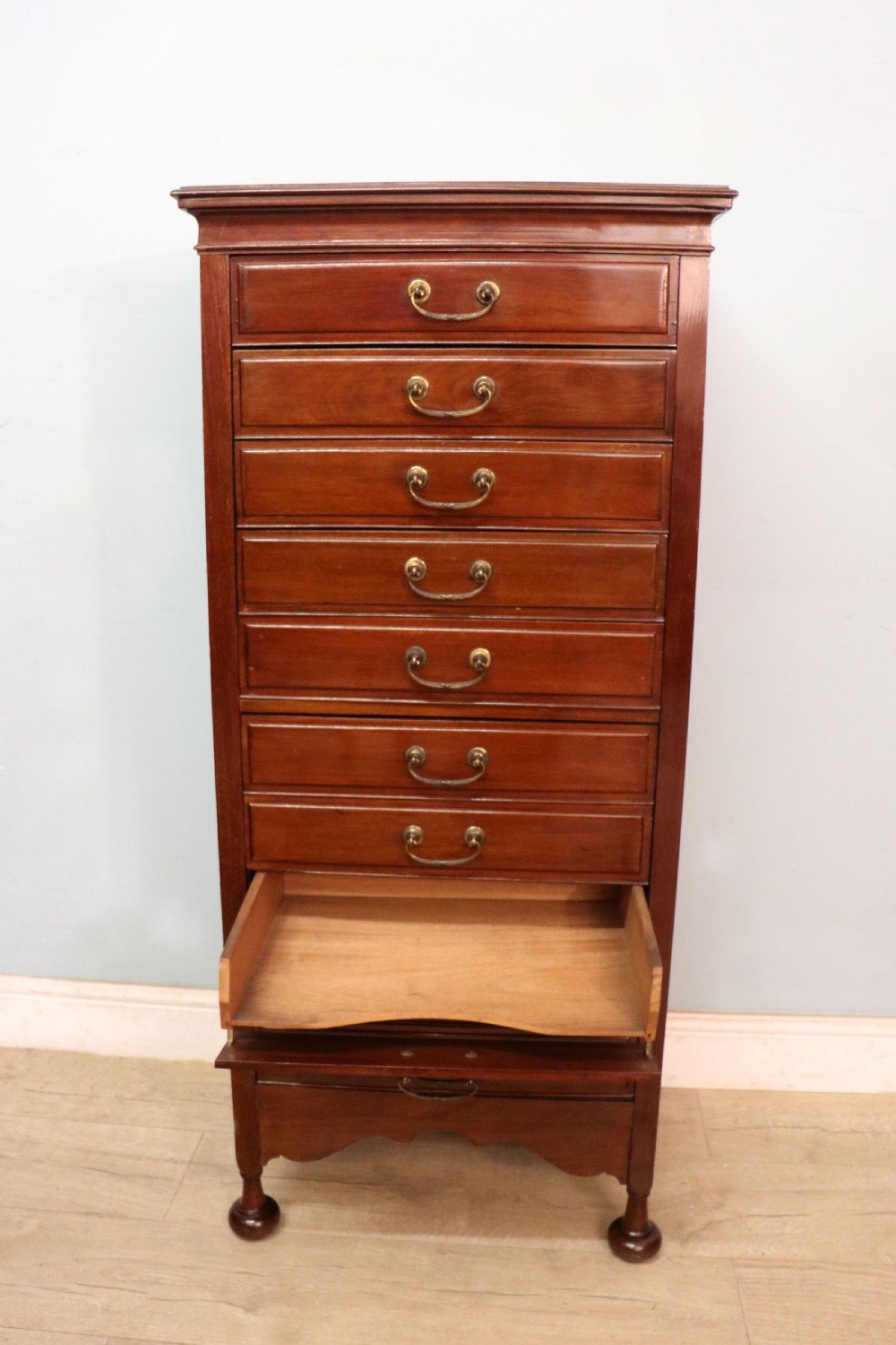 A lovely unusual early 20th century mahogany music cabinet or chest with ten drawers. View X