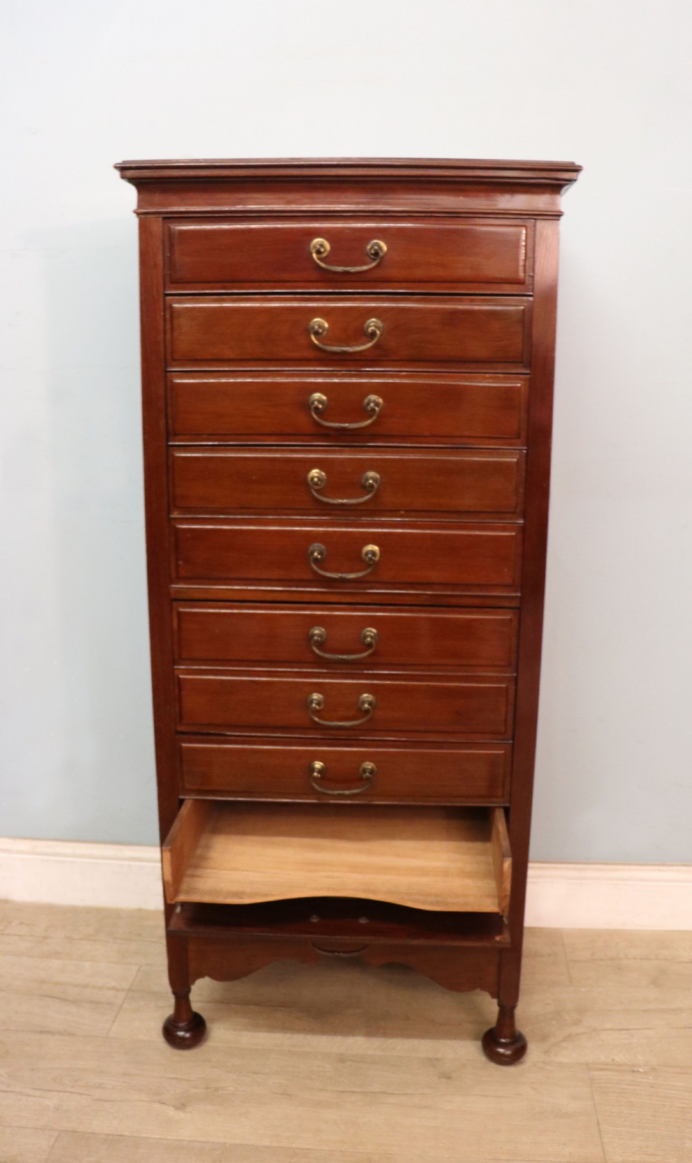 A lovely unusual early 20th century mahogany music cabinet or chest with ten drawers. View XI