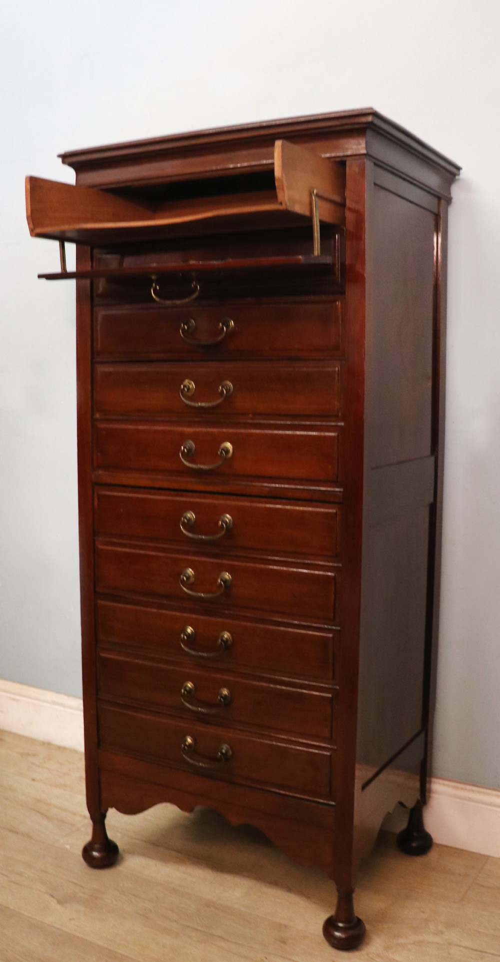 A lovely unusual early 20th century mahogany music cabinet or chest with ten drawers. View XIV