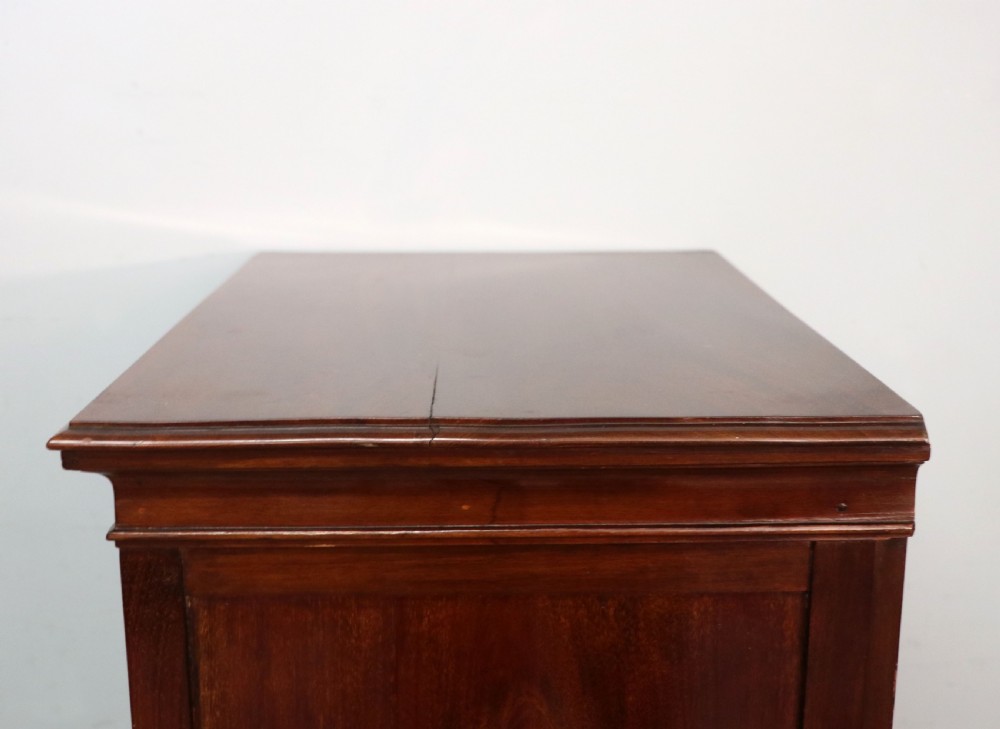 A lovely unusual early 20th century mahogany music cabinet or chest with ten drawers. View XVII