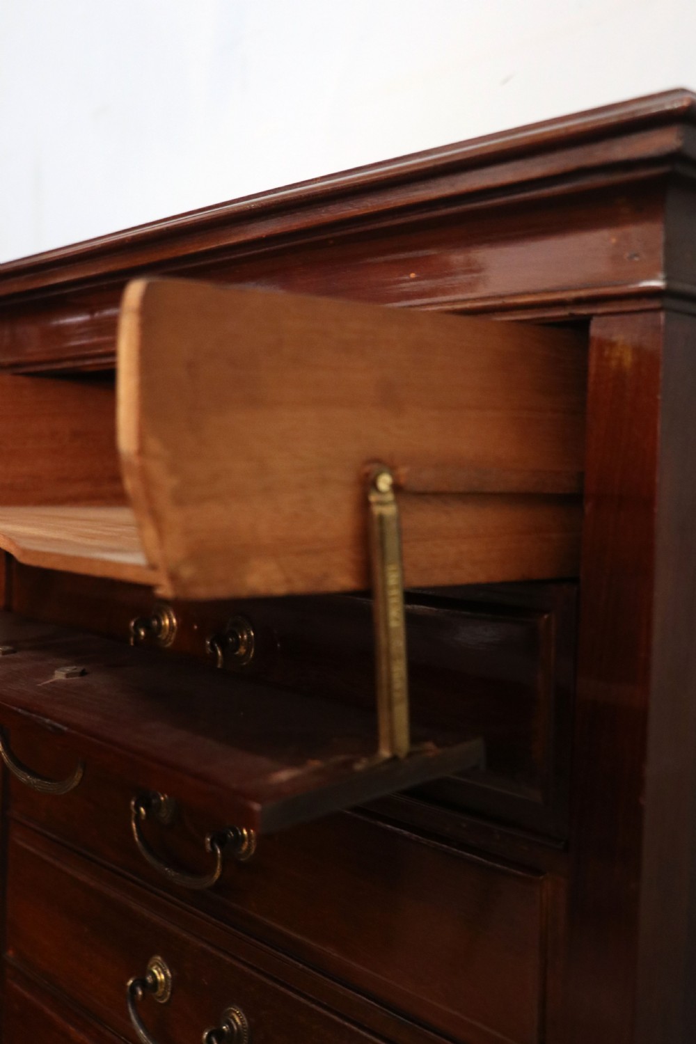 A lovely unusual early 20th century mahogany music cabinet or chest with ten drawers. View XX