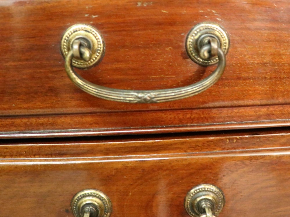 A lovely unusual early 20th century mahogany music cabinet or chest with ten drawers. View XXI