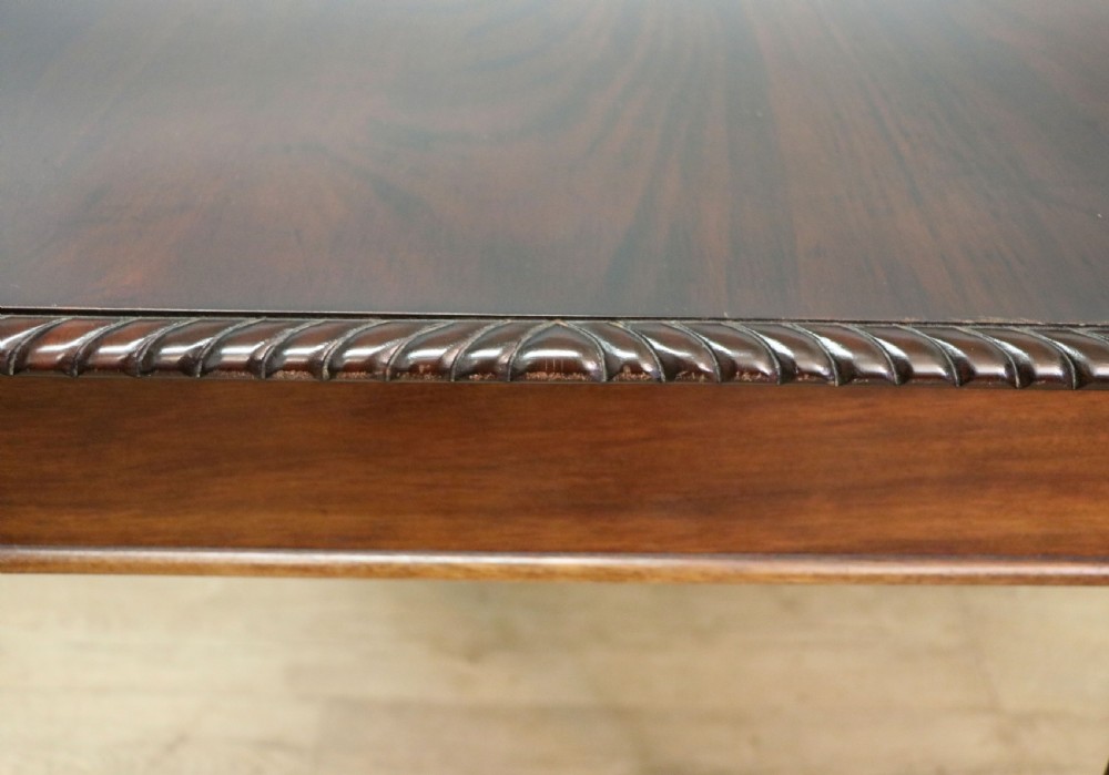 An Edwardian rectangular mahogany side table featuring carved rope-twist edging and square tapered legs. View VII
