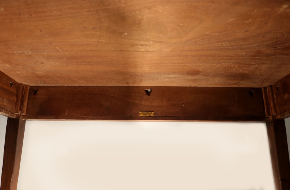 An Edwardian rectangular mahogany side table featuring carved rope-twist edging and square tapered legs. View XI