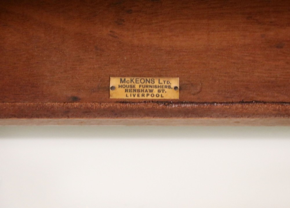 An Edwardian rectangular mahogany side table featuring carved rope-twist edging and square tapered legs. View XII