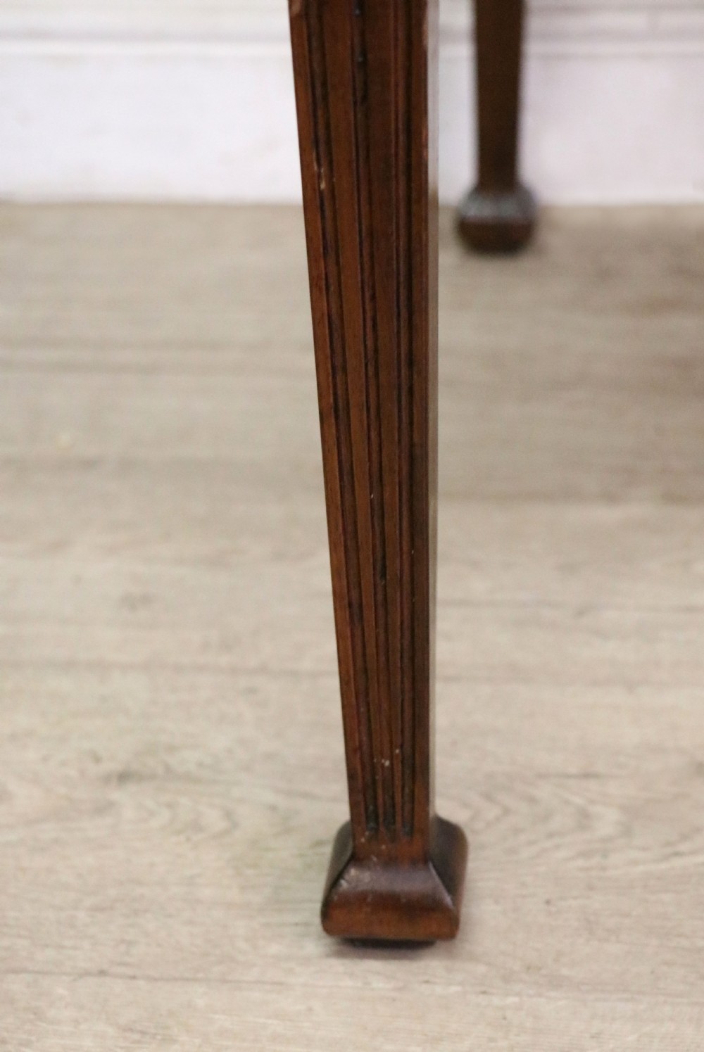An Edwardian rectangular mahogany side table featuring carved rope-twist edging and square tapered legs. View XVII