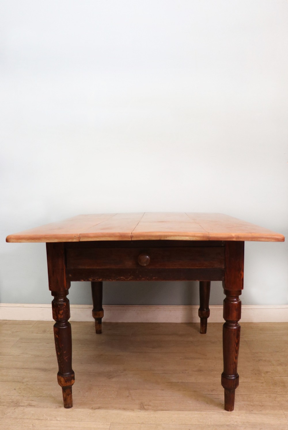 A lovely Victorian pine kitchen table with plank top. View III