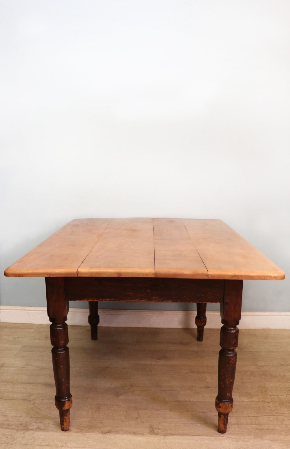 A lovely Victorian pine kitchen table with plank top. View IV