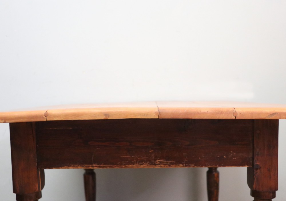 A lovely Victorian pine kitchen table with plank top. View VII