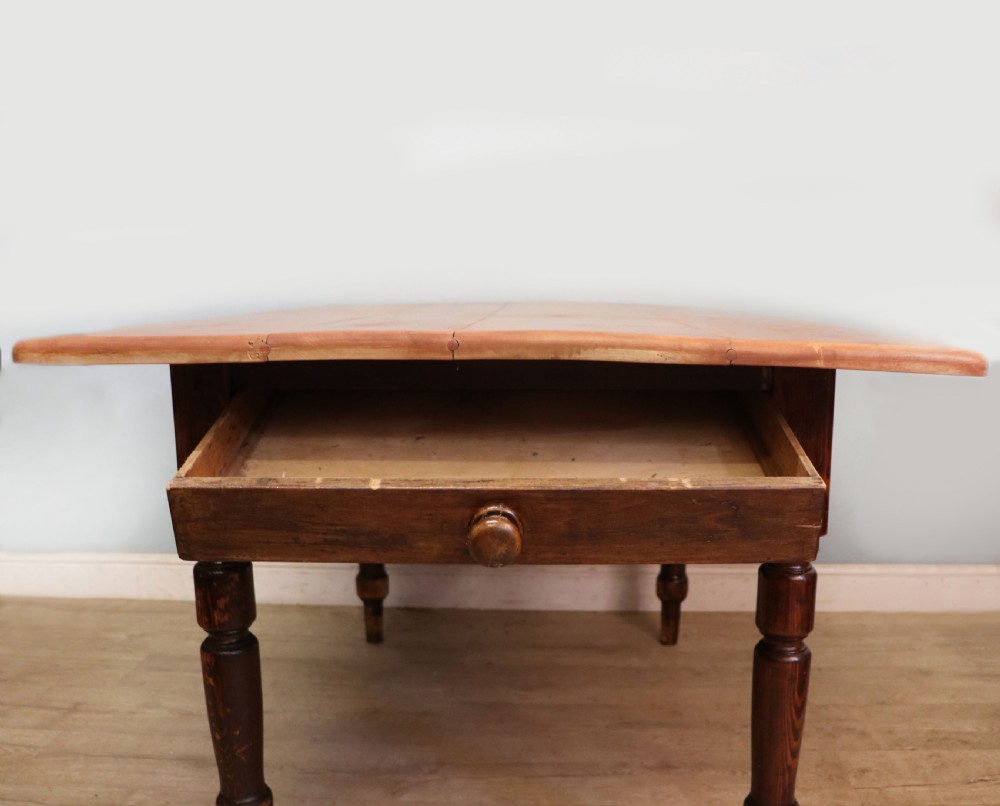 A lovely Victorian pine kitchen table with plank top. View IX