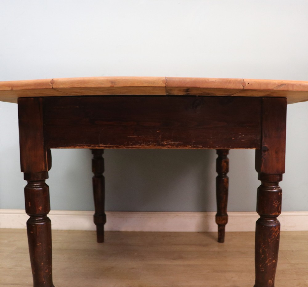 A lovely Victorian pine kitchen table with plank top. View X