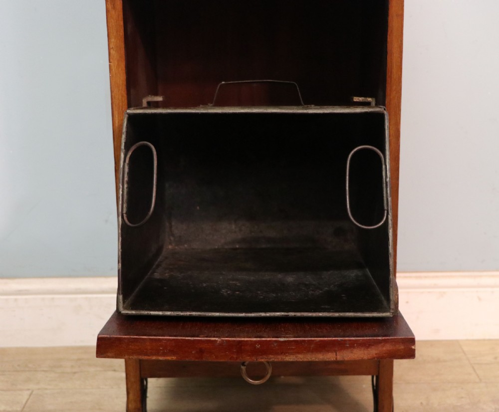 A tall dark wood Art Nouveau coal box featuring botanical marquetry inlay and brass ring handles, supported on castors. View X