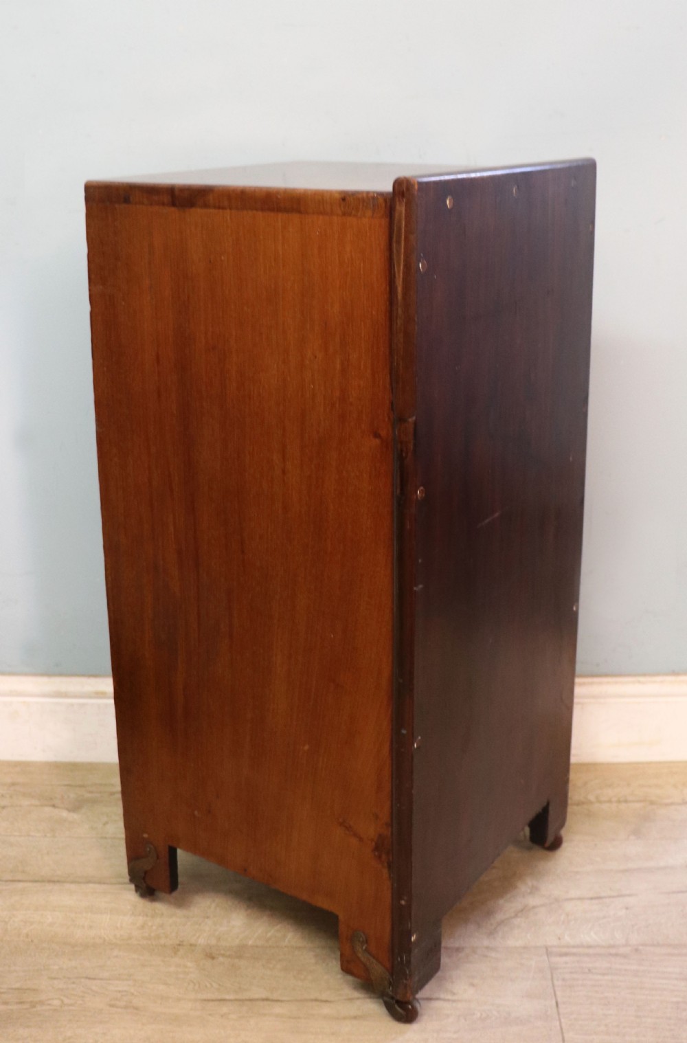 A tall dark wood Art Nouveau coal box featuring botanical marquetry inlay and brass ring handles, supported on castors. View XIV