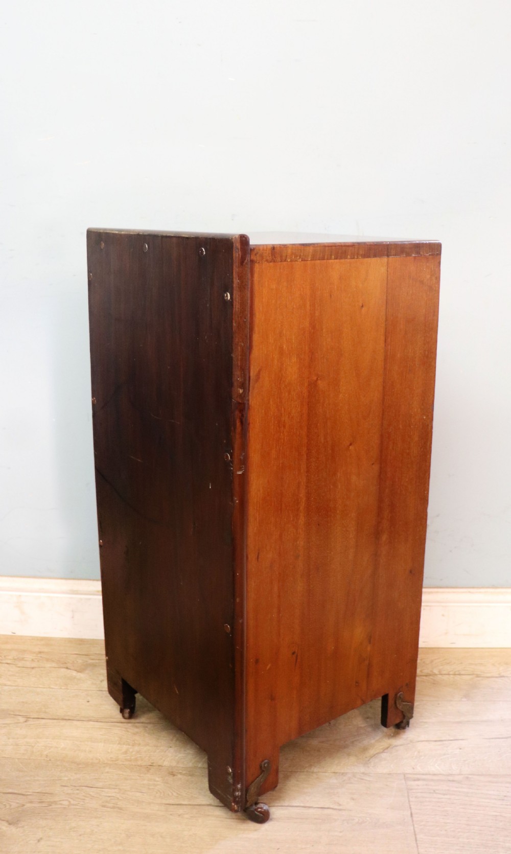 A tall dark wood Art Nouveau coal box featuring botanical marquetry inlay and brass ring handles, supported on castors. View XV