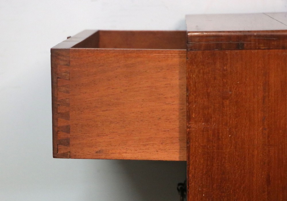 A tall dark wood Art Nouveau coal box featuring botanical marquetry inlay and brass ring handles, supported on castors. View XXIII
