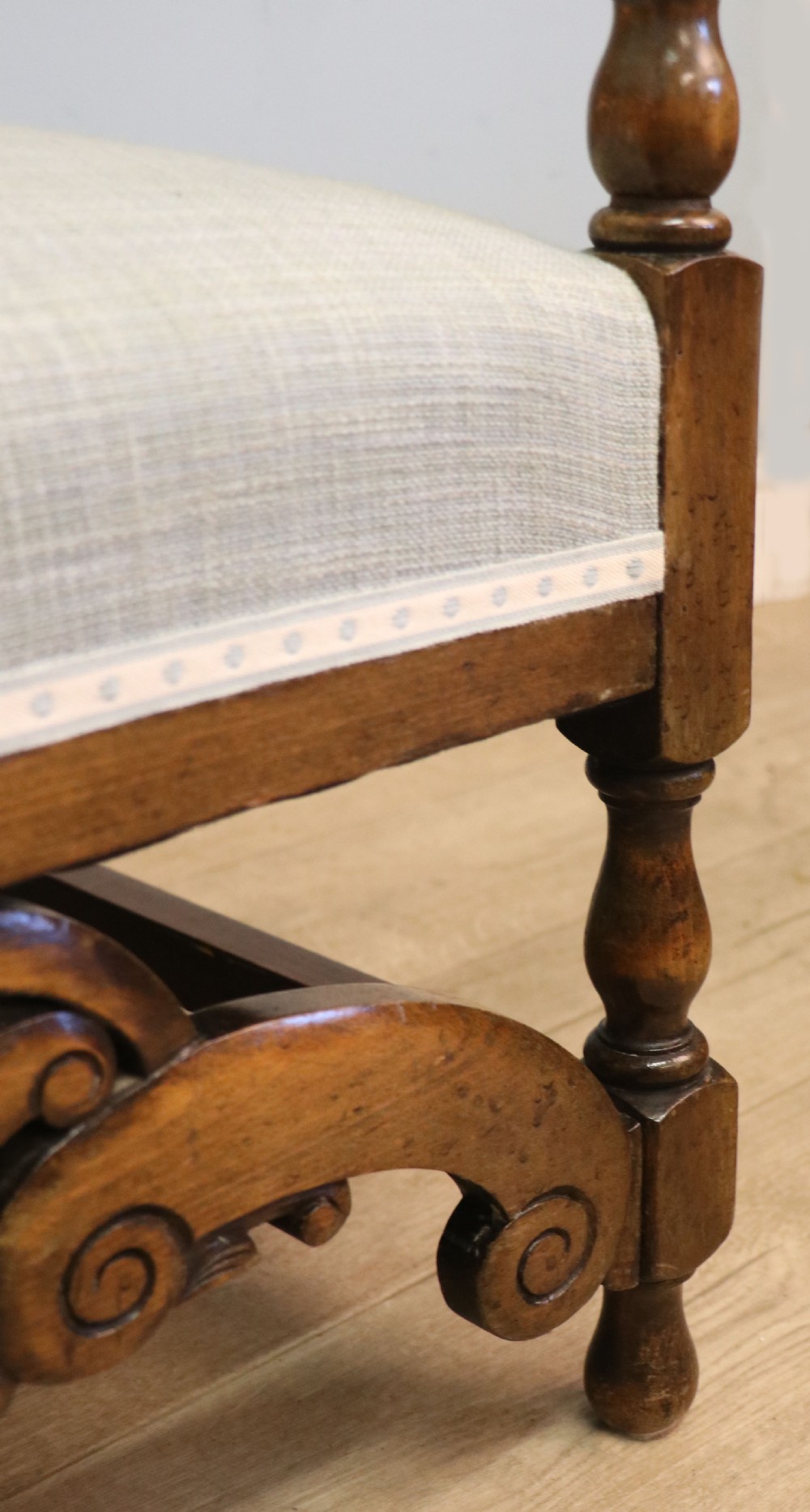  A charming early 20th century two-seater solid oak framed sofa modelled in the late 17th century style.  View XX