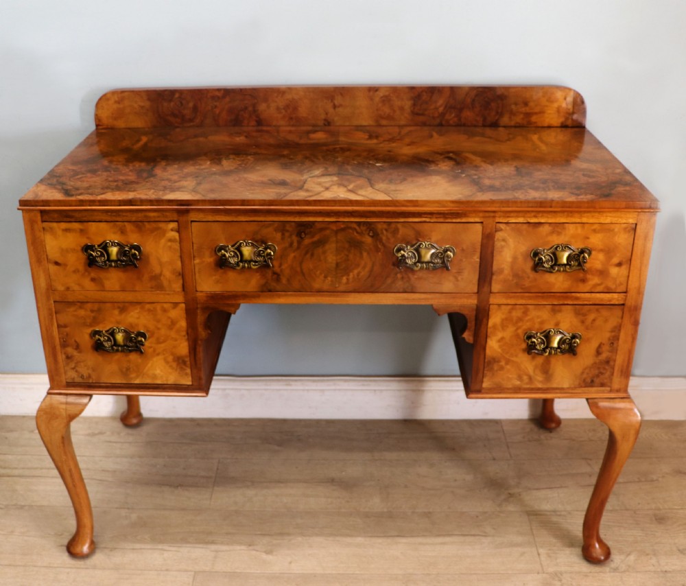 An absolutely lovely piece of Queen Anne revival walnut furniture from the 1930’s. 
