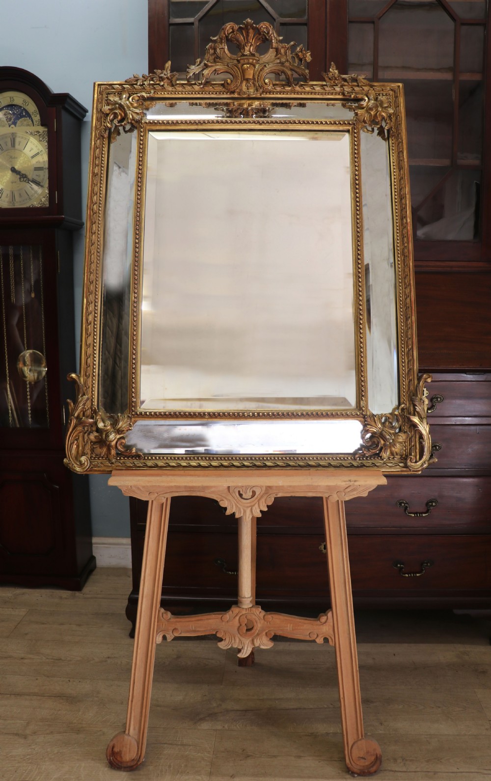 This lovely 19th century French mirror is of cushion form. View II
