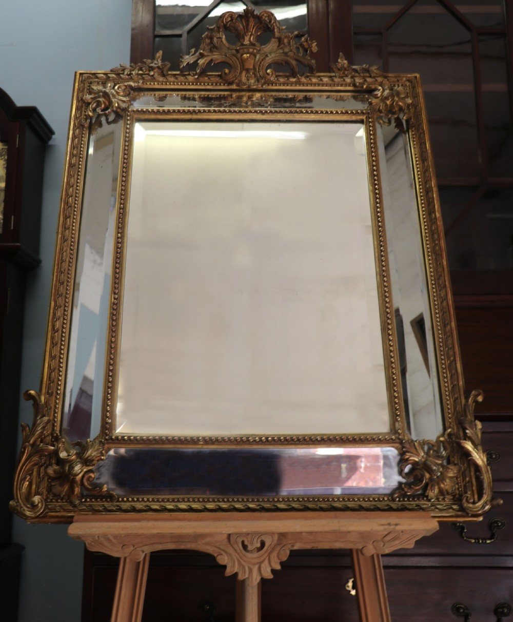 This lovely 19th century French mirror is of cushion form. View III