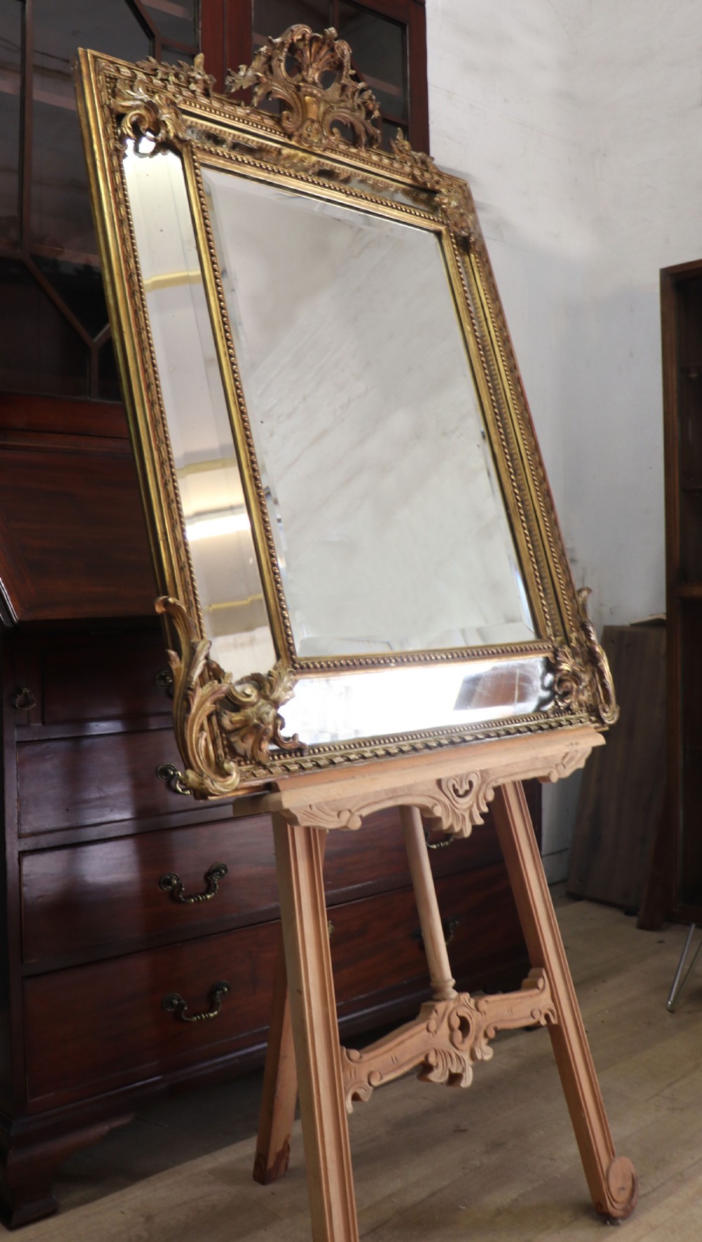 This lovely 19th century French mirror is of cushion form. View IV