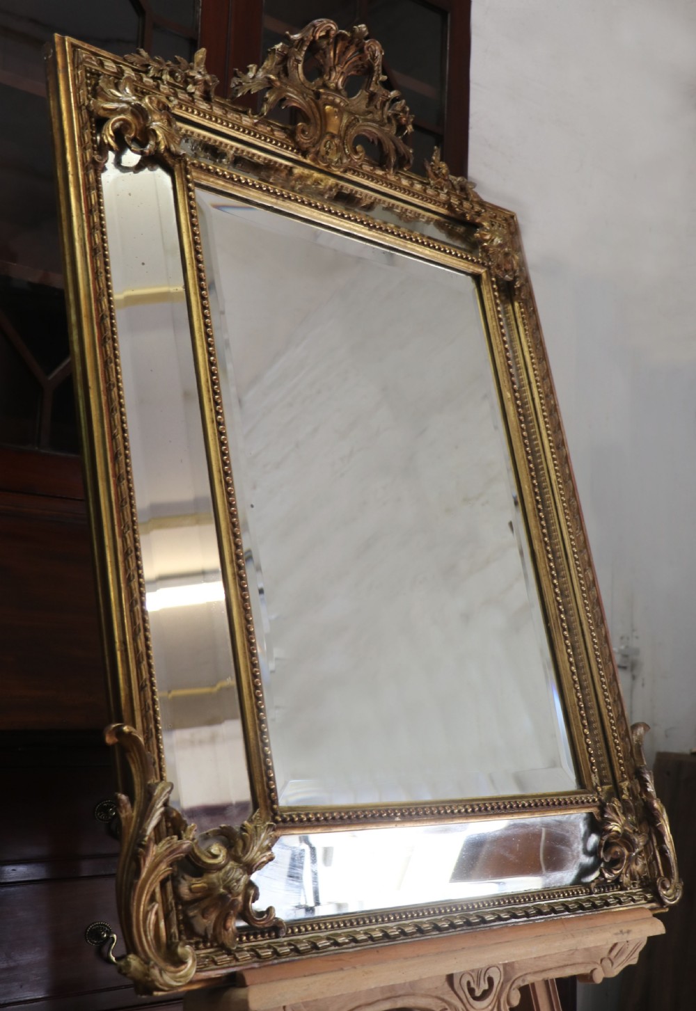 This lovely 19th century French mirror is of cushion form. View V