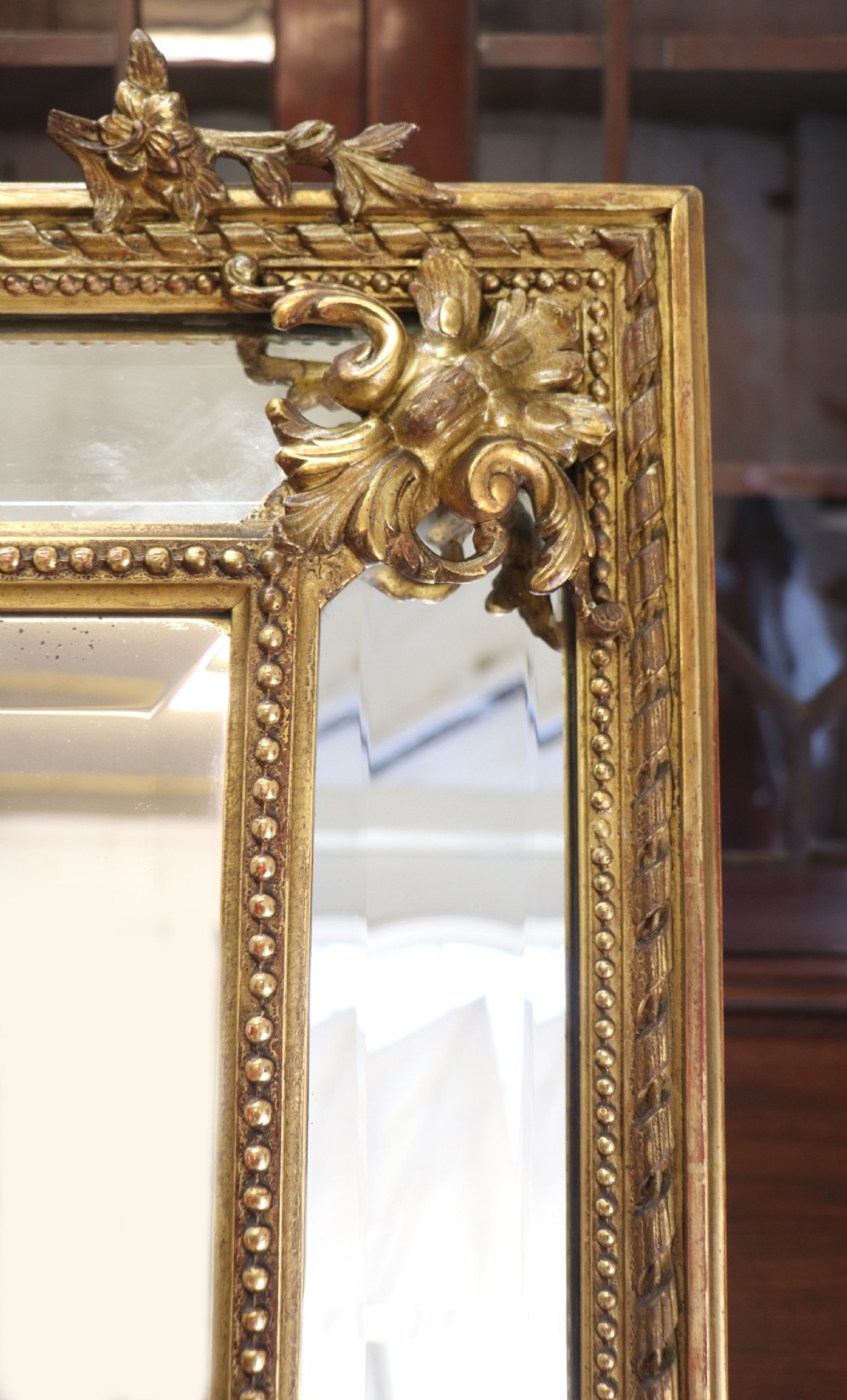 This lovely 19th century French mirror is of cushion form. View XIII