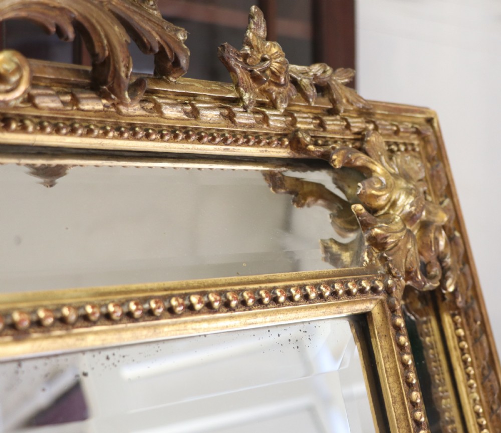This lovely 19th century French mirror is of cushion form. View XIV