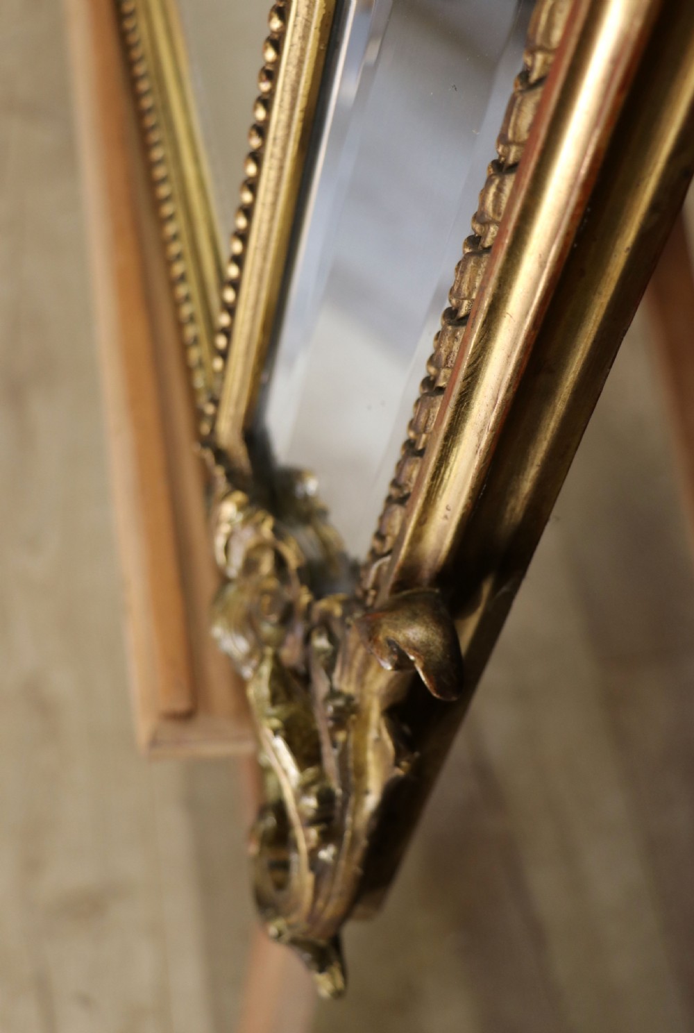 This lovely 19th century French mirror is of cushion form. View XXI