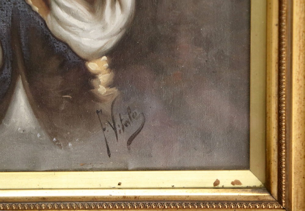 A pair of framed Italian oil portraits depicting an elderly man smoking a pipe and an elderly woman wearing a blue headscarf, both set in matching giltwood frames. View VIII