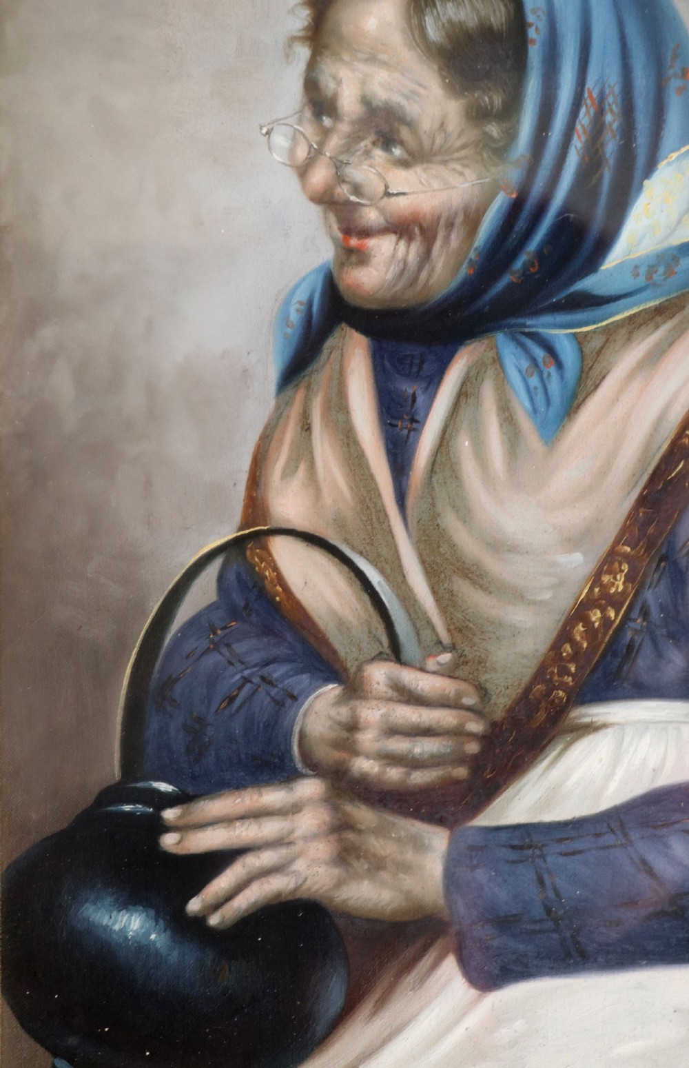 A pair of framed Italian oil portraits depicting an elderly man smoking a pipe and an elderly woman wearing a blue headscarf, both set in matching giltwood frames. View XII