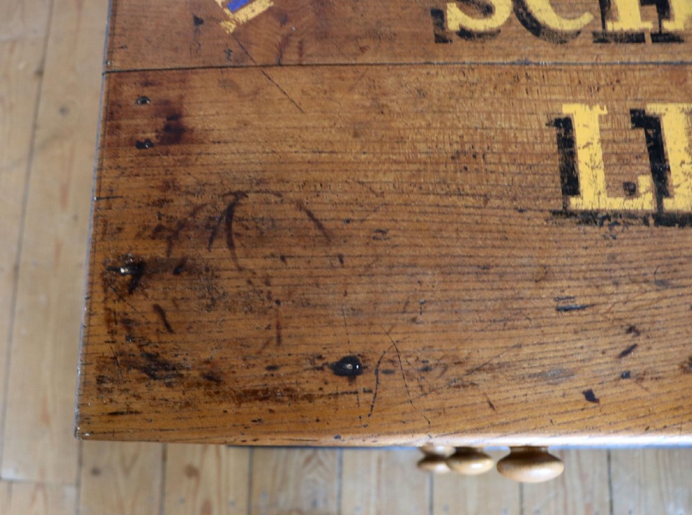A Victorian black painted pine chest of drawers featuring a natural timber top with hand-painted lettering and turned wooden knobs. View VIII