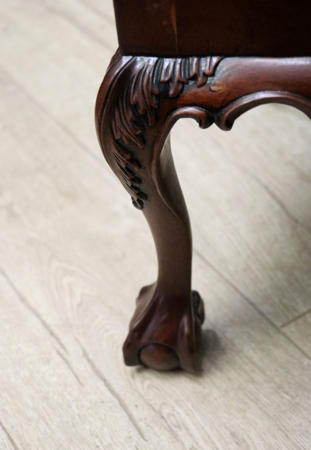 A pair of Georgian revival style child carver chairs made of polished dark mahogany with pierced splat backs, cabriole legs, ball and claw feet, and yellow damask upholstered seats. View XXII