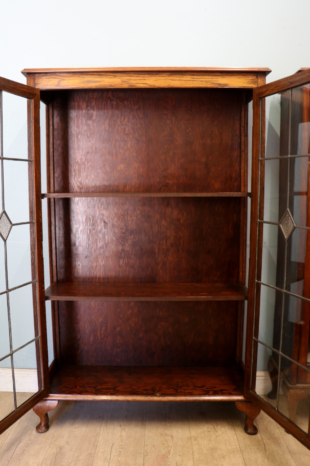A lovely early 20th century oak framed and lead glazed display cabinet. View VII
