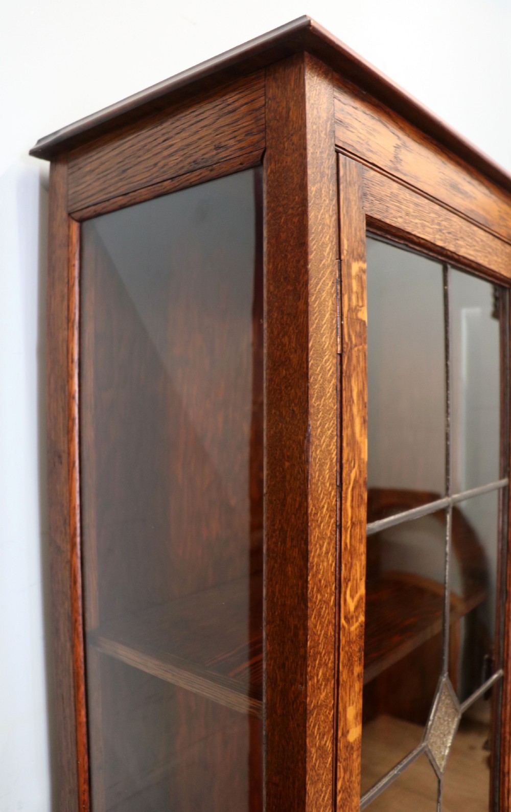 A lovely early 20th century oak framed and lead glazed display cabinet. View VIII