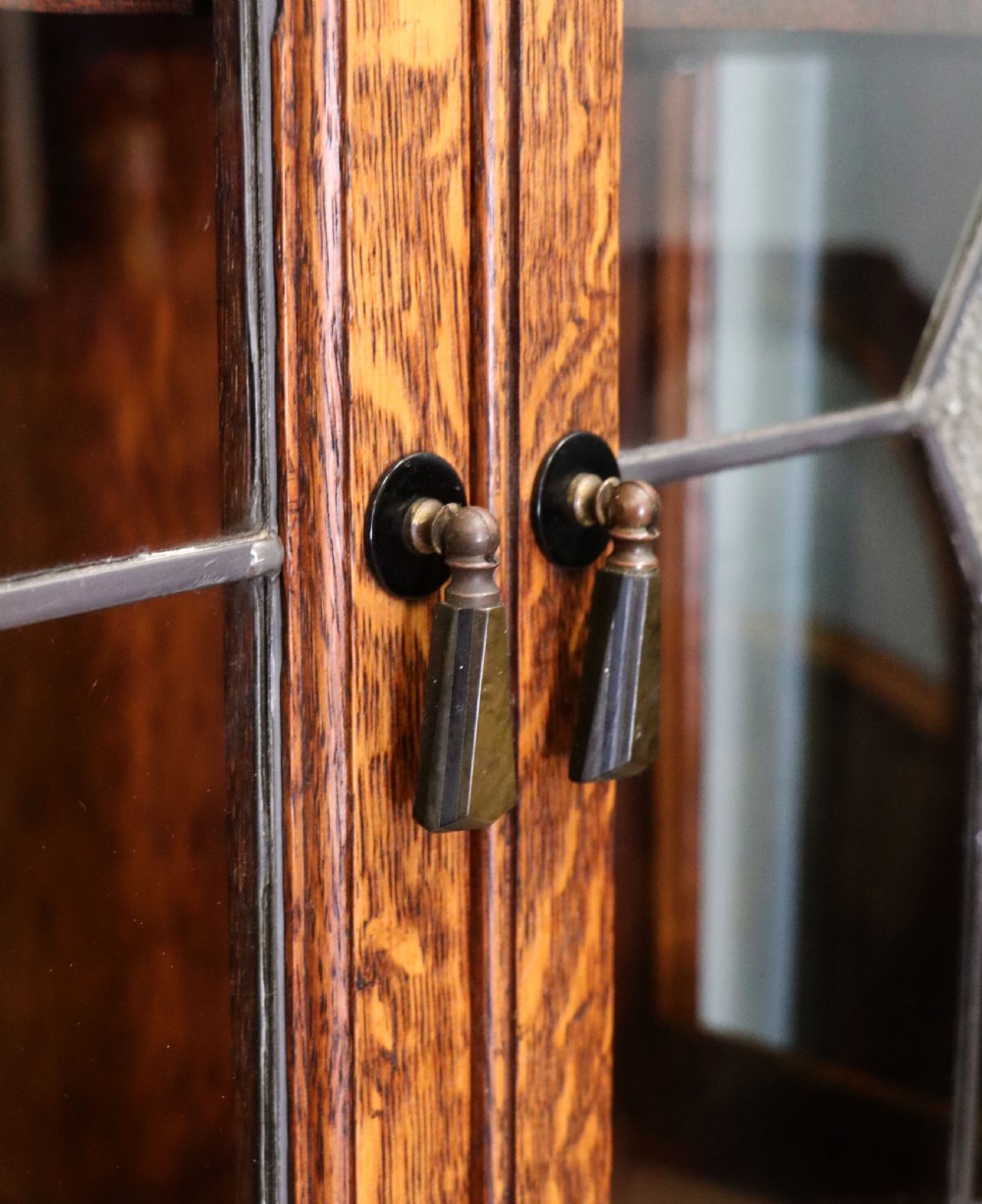 A lovely early 20th century oak framed and lead glazed display cabinet. View XIII