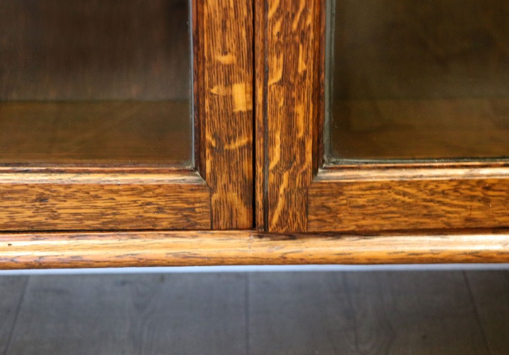 A lovely early 20th century oak framed and lead glazed display cabinet. View XXIV
