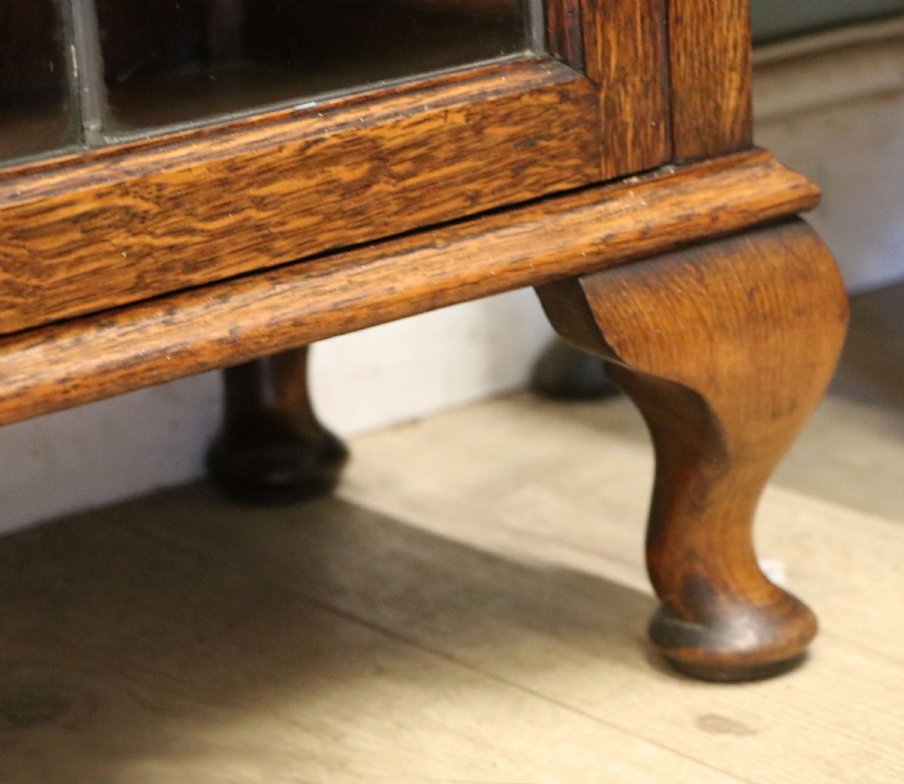 A lovely early 20th century oak framed and lead glazed display cabinet. View XXV