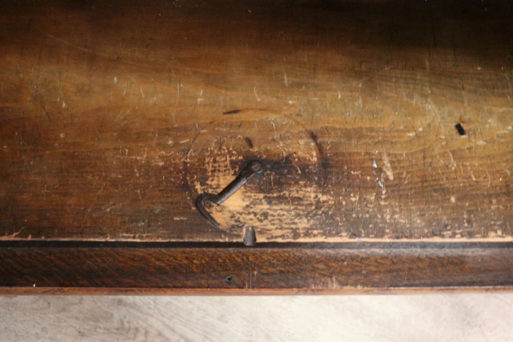 An early twentieth-century mahogany framed bookcase featuring two glazed doors decorated with the Home Office royal coat of arms stencil, supported on cabriole legs. View XXV