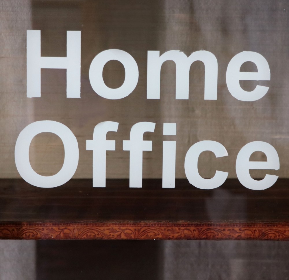 A beautiful quality Victorian mahogany bookcase cabinet, later sign written with the Home Office logo.  View XIV
