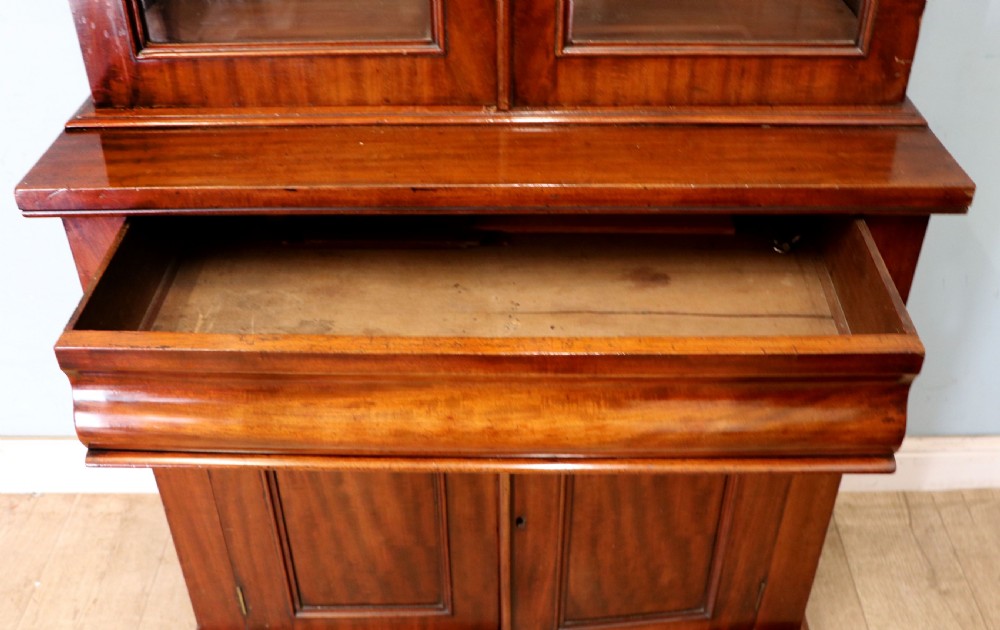 A beautiful quality Victorian mahogany bookcase cabinet, later sign written with the Home Office logo.  View XXX