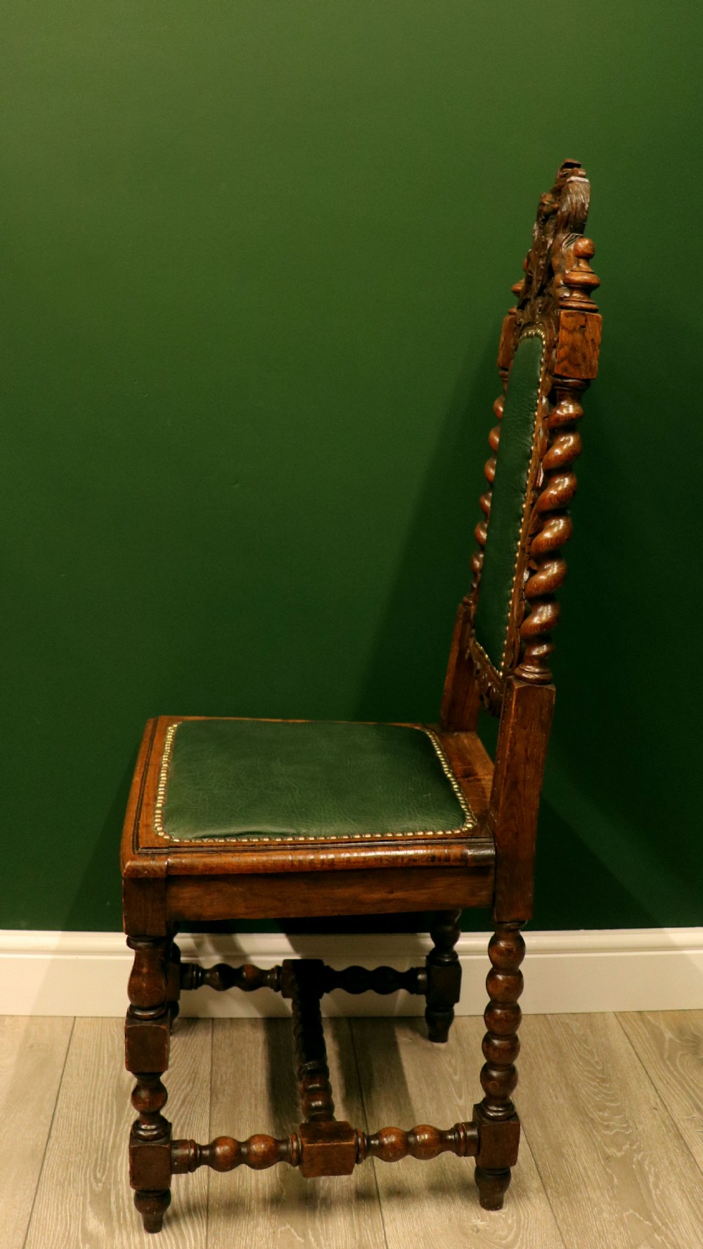 A lovely Victorian oak framed beautifully carved hall chair in the Carolean gothic revival style. View IV